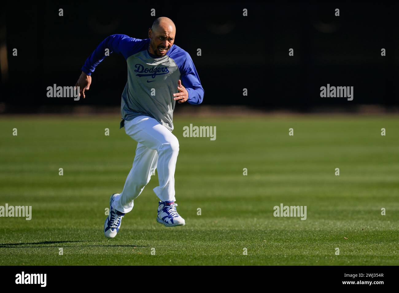 Los Angeles Dodgers' Mookie Betts runs sprints during spring training