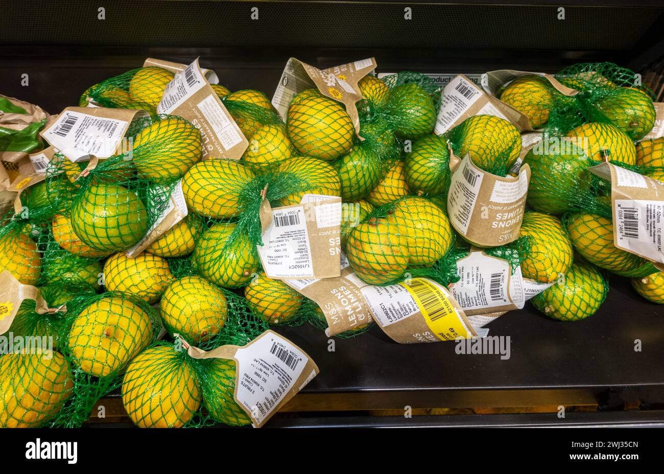Fresh lemons and limes at M&S Food Liverpool One Stock Photo Alamy