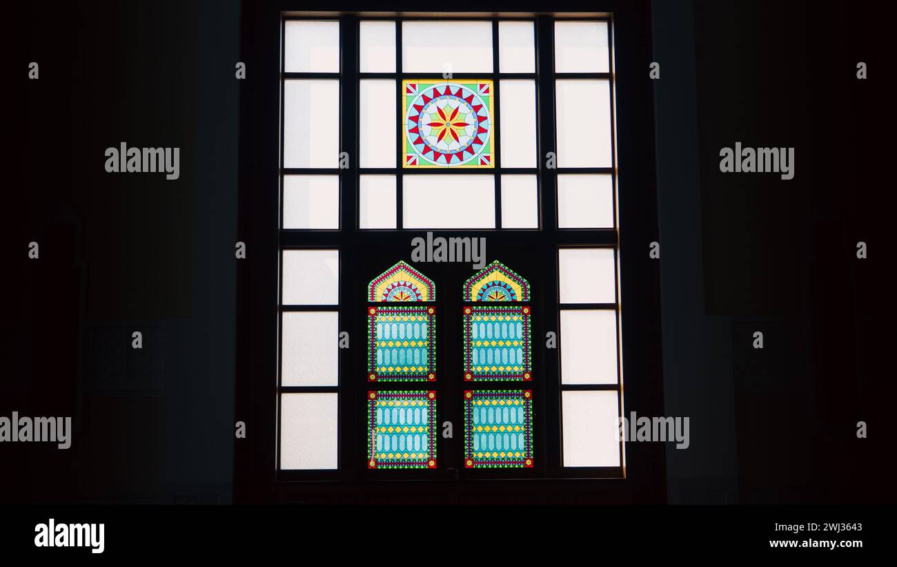 doha,qatar- february 02,2024: Sun light coming through the colorful ...