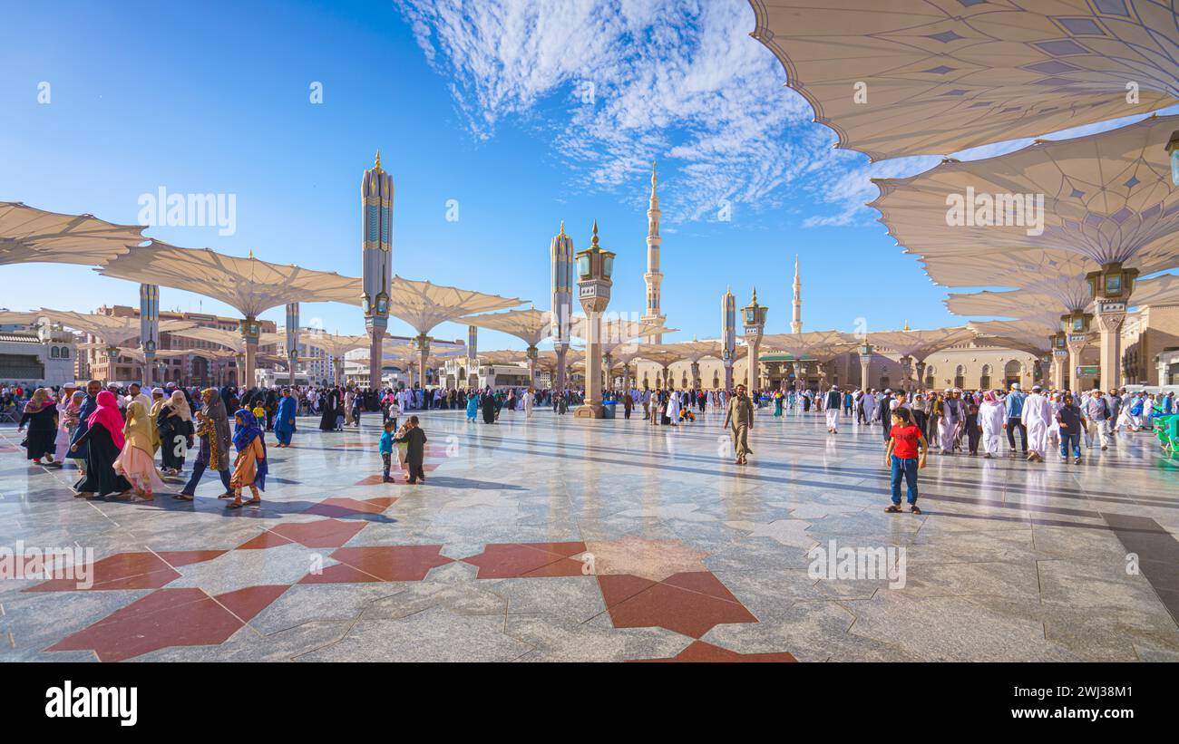 Al-Madinah al-Munawwarah - Mar 09 2023, Pilgrims walk through the main mosque of the Prophet Muhammad Al-Masjid an-Nabawi, Medina, Saudi Arabia Stock Photo