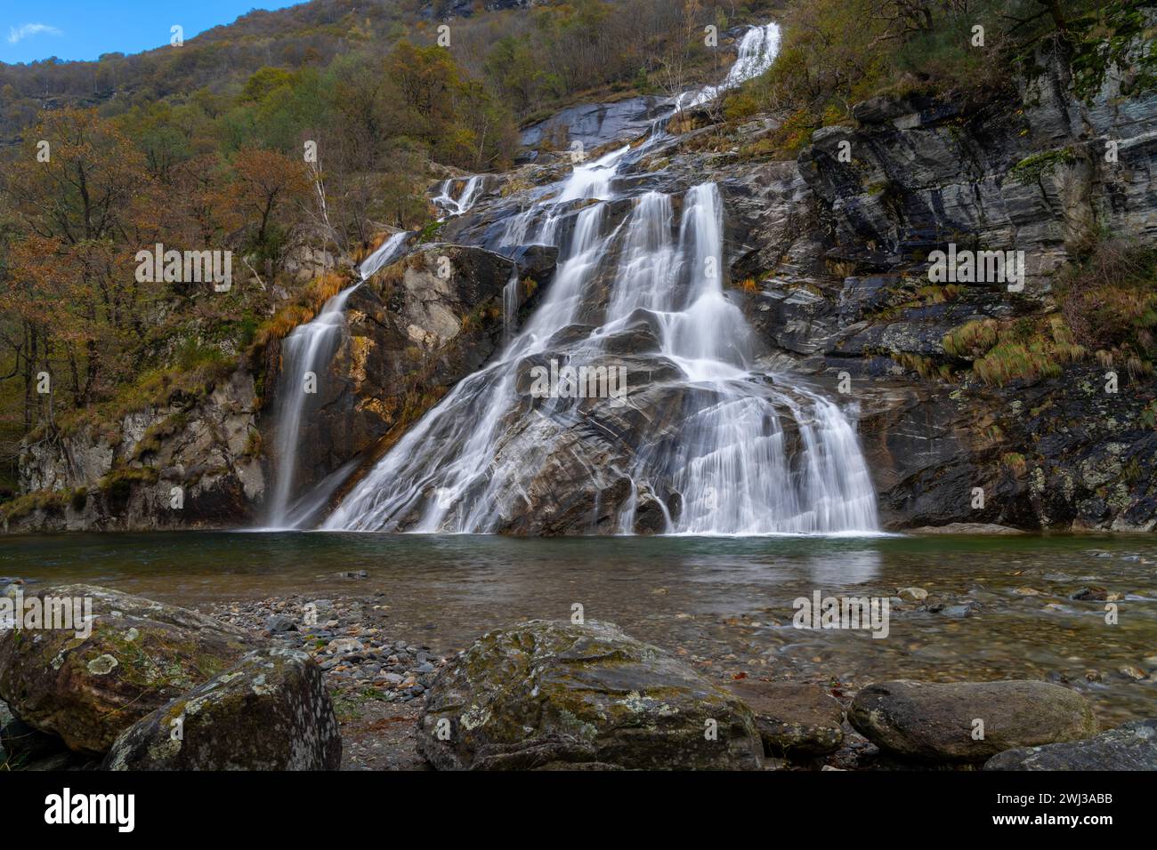Autumn landscape view of the Cascata delle Sponde waterfall near Someo in the Ticino in Switzerland Stock Photo