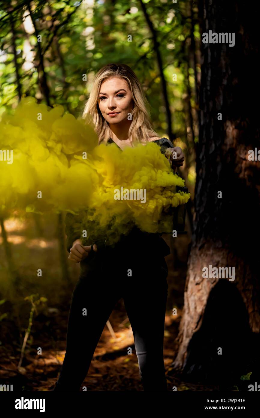 A Lovely Blonde Model Poses Outdoor While Enjoying The Fall Weather Stock Photo