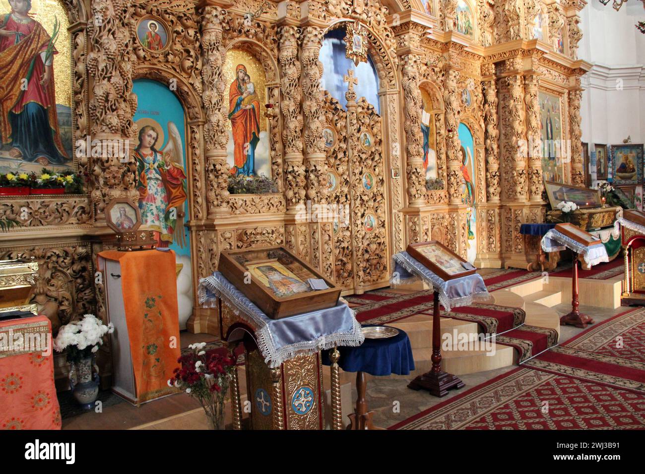 Wooden iconostasis in the Catherine Church in the city of Chernihiv. Religion in Ukraine. Slavonic c Stock Photo