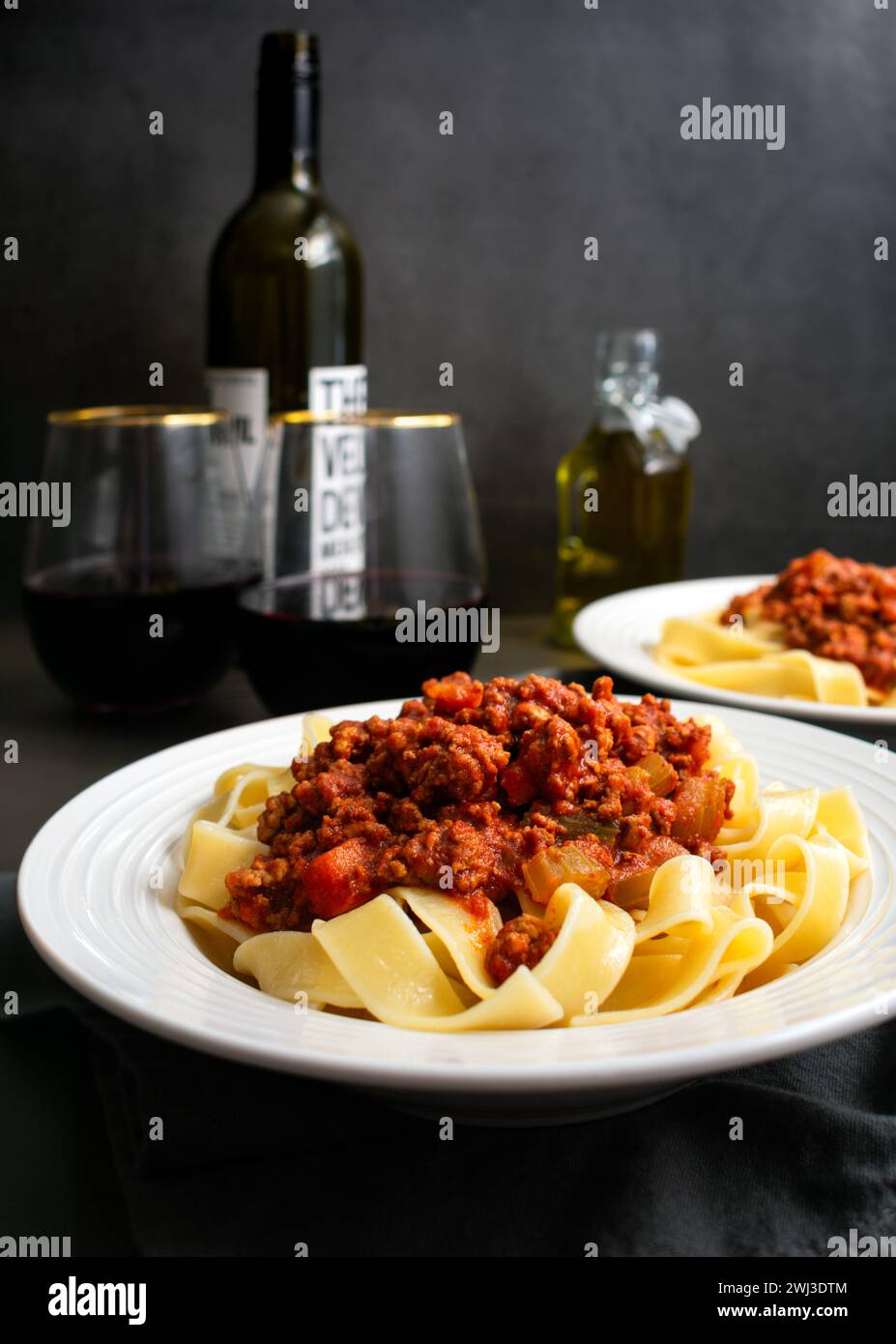 Closeup of a Bowl of Authentic Bolognese Sauce Served Over Pappardelle