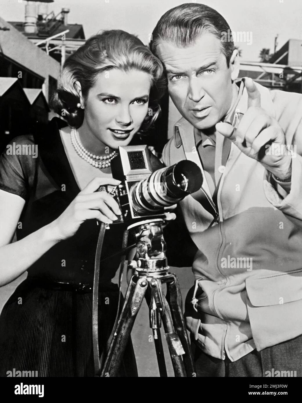 Grace Kelly and James Stewart with a camera - Publicity Photo for the Alfred Hitchcock directed film Rear Window, 1954 Stock Photo