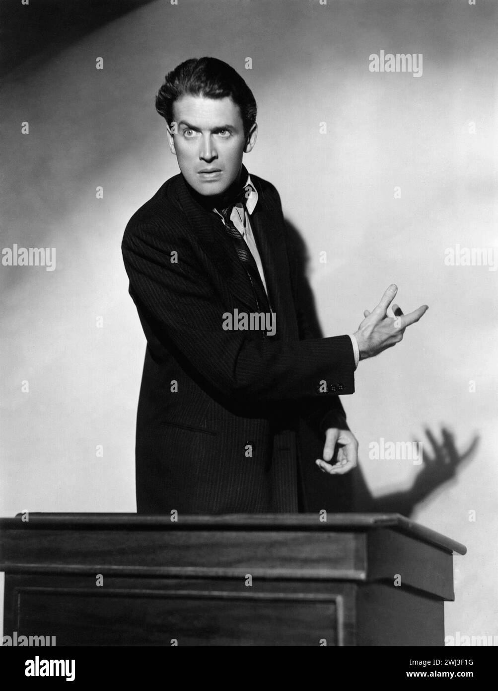 American film star James Stewart (1908 - 1997) presents his case from the witness box. A scene from the political satire 'Mr Smith Goes to Washington', directed by Frank Capra for Columbia. Publicity photo. Stock Photo