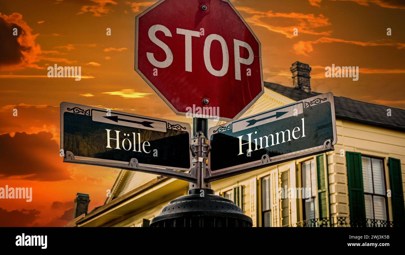 Signposts the direct way to Heaven versus Hell Stock Photo