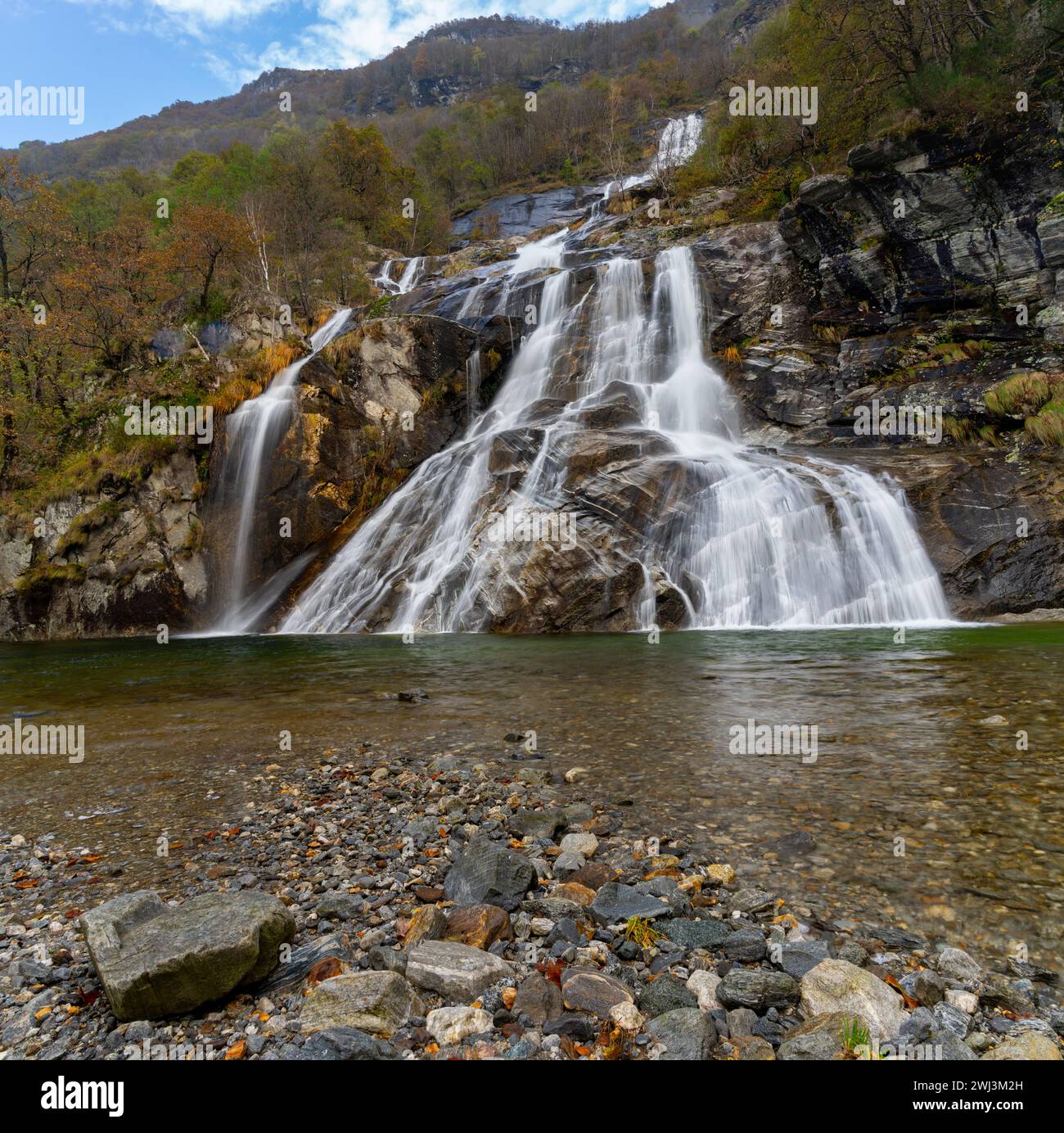 Autumn landscape view of the Cascata delle Sponde waterfall near Someo in the Ticino in Switzerland Stock Photo