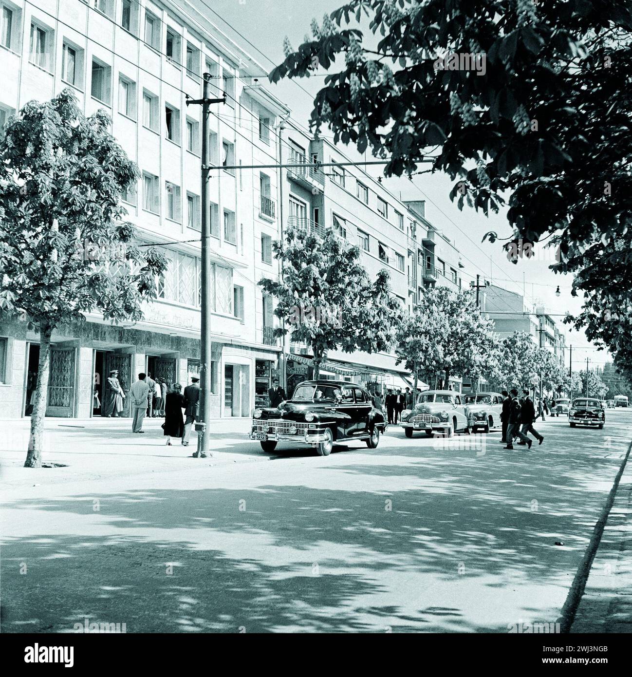 Atatürk Boulevard, Grand Movie Theater and the Office Block, 1950s.  From left to right: Grand Movie Theatre, And (Pledge) Apartment Building of Turgut Demirdağ and Bulvar Apartment Building of Öztrak Family. It is not in the photo yet, Stock Photo