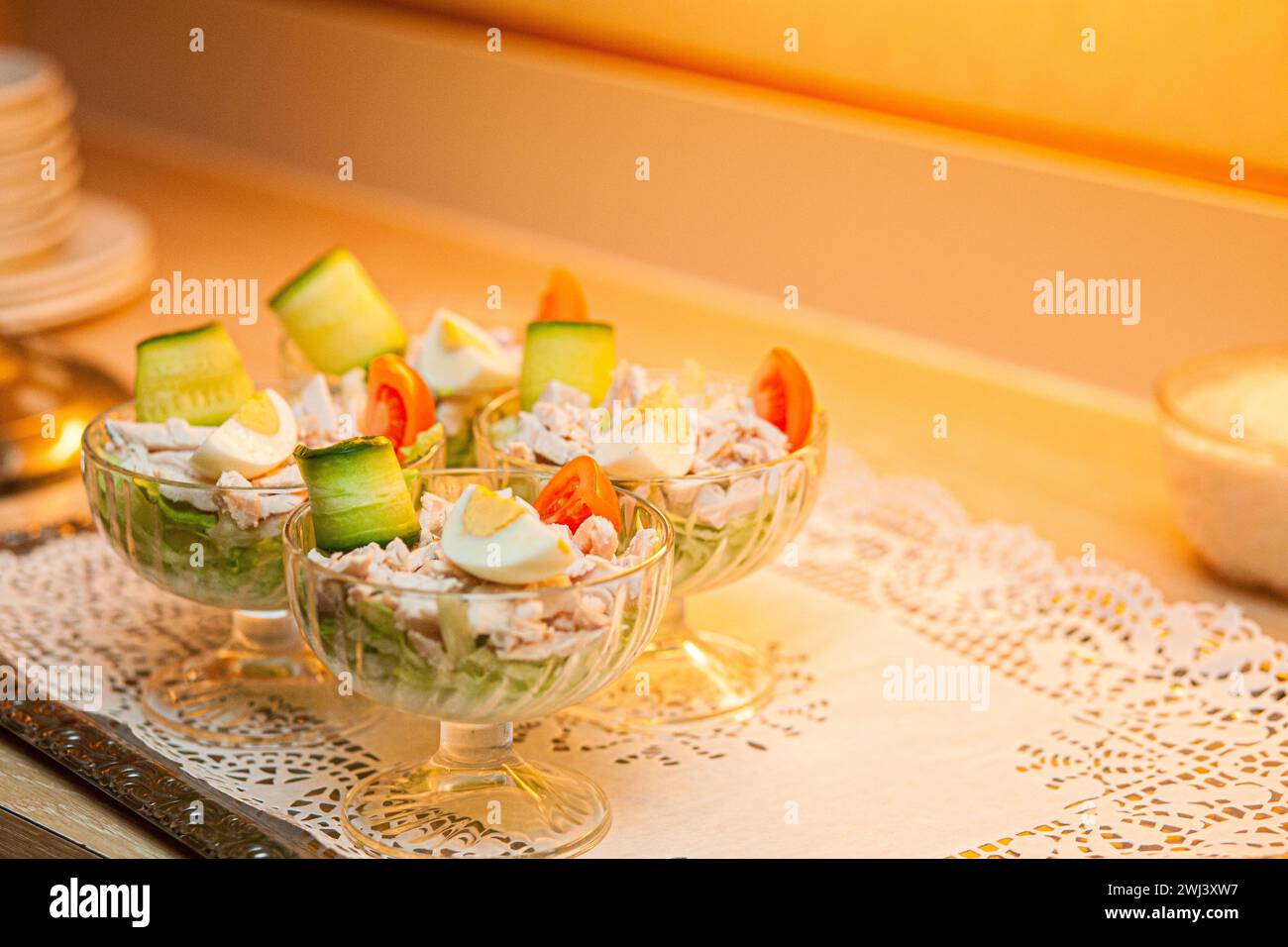 Savory Delight: Fresh Salad Presentation in Glass Bowls Stock Photo