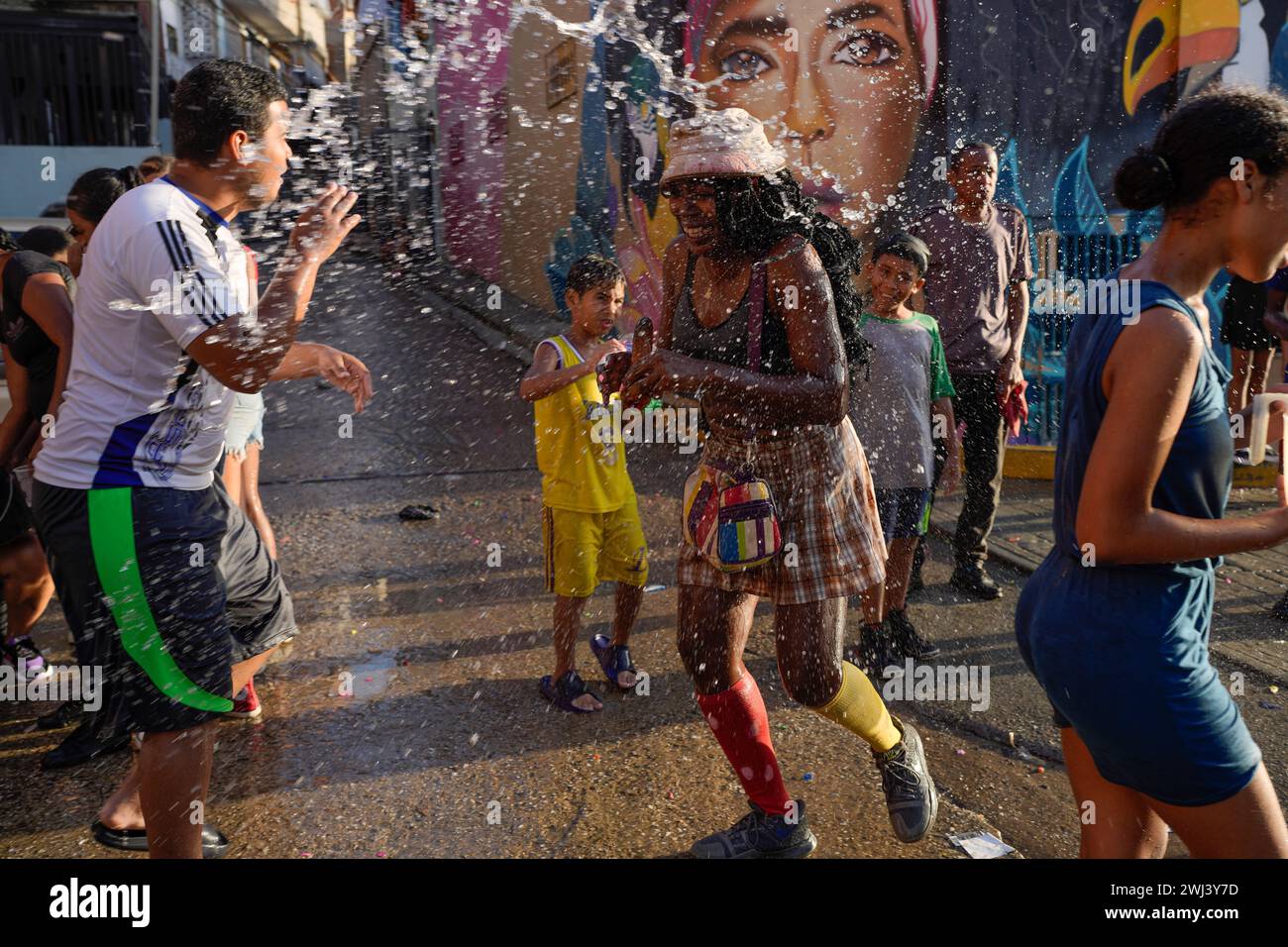 People Play With Water During Carnival Celebrations In The San Agustin people-play-with-water-during-carnival-celebrations-in-the-san-agustin