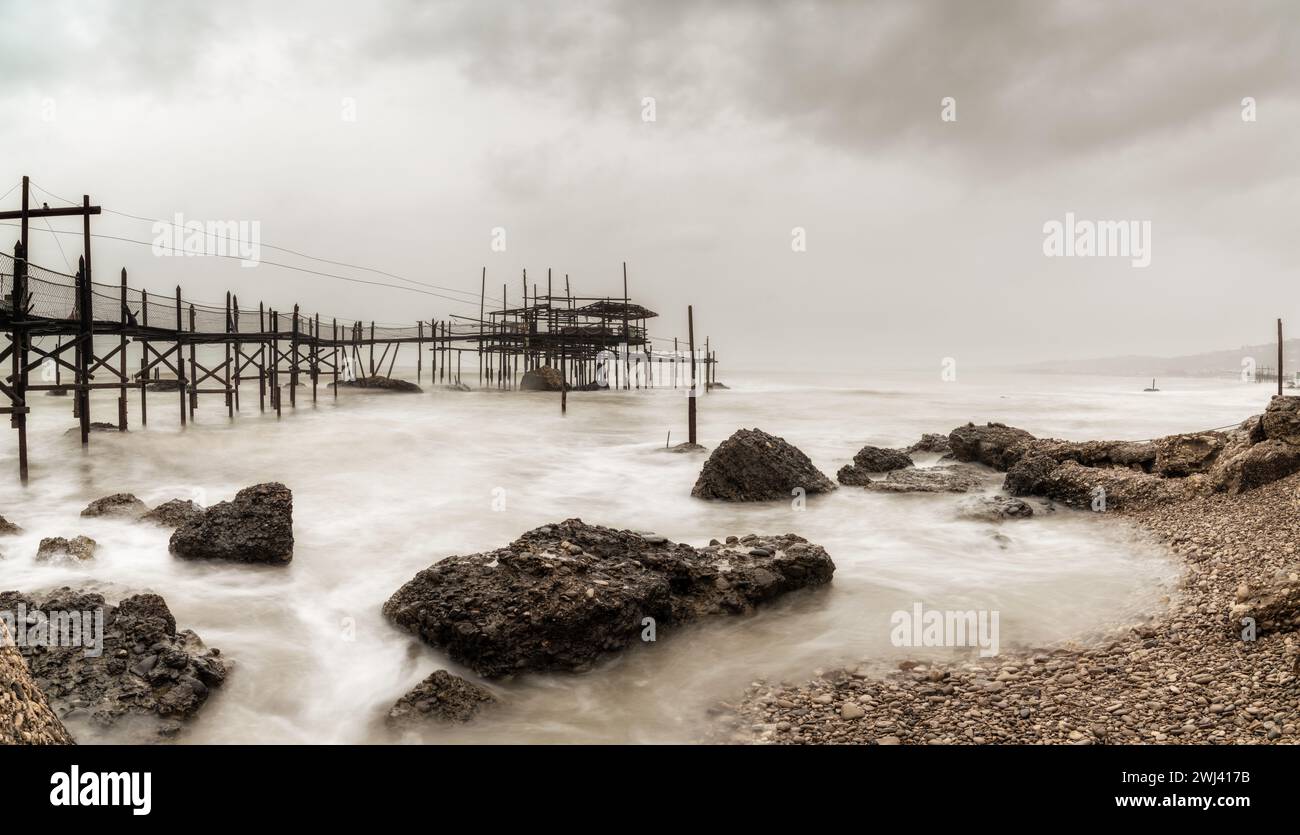 View of the Trabocco Cungarelle pile dwelling on an overcast an rainy day on the Costa dei Trabocchi in Italy Stock Photo