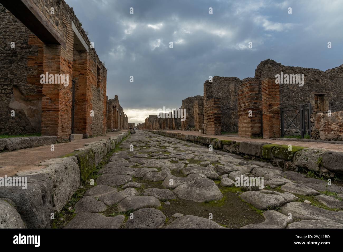 Tyoical city street and houses in the ancient Roman town of Pompeii Stock Photo