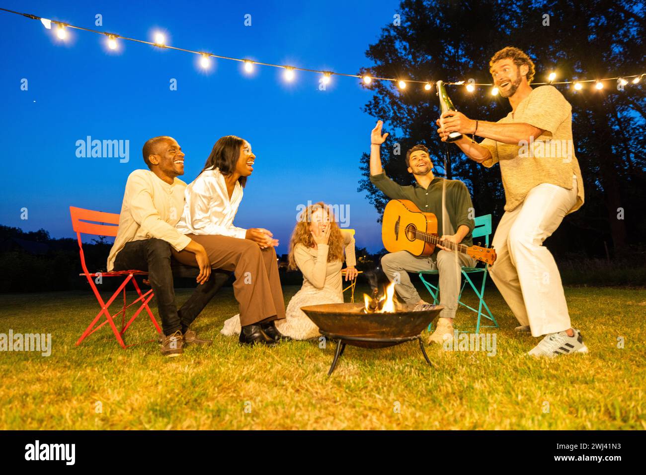Twilight Melodies: An Evening of Music and Laughter Stock Photo
