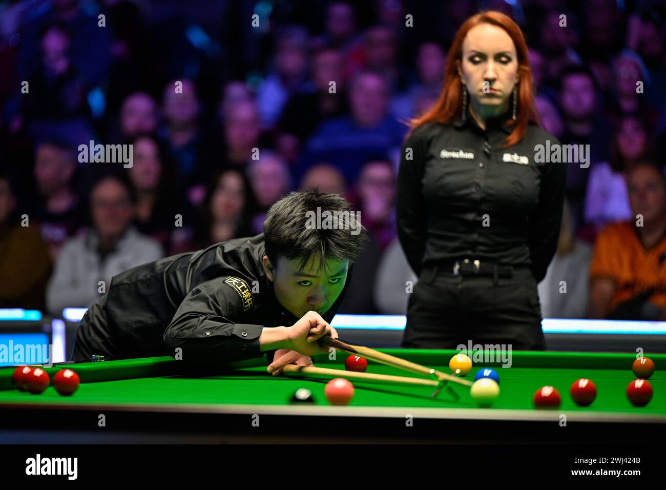 Jiang Jun takes a shoot, during the 2024 BetVictor Welsh Open at Venue ...