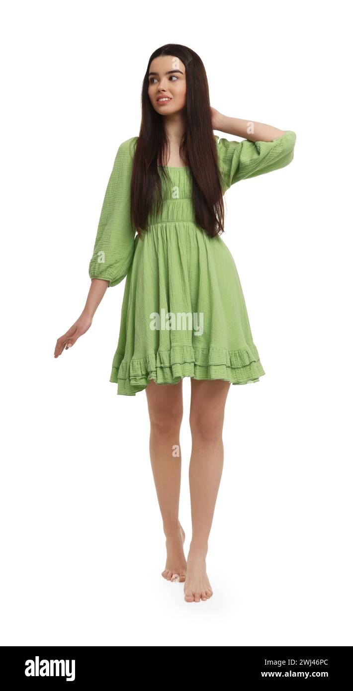 Beautiful girl in green dress on white background Stock Photo - Alamy