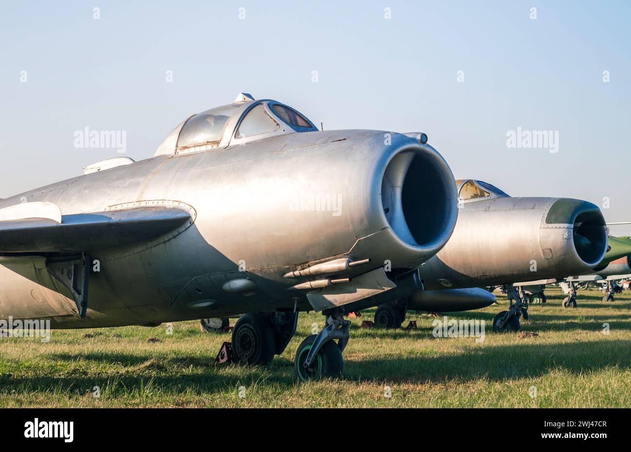 Old soviet army military fighter aircraft at the airport Stock Photo