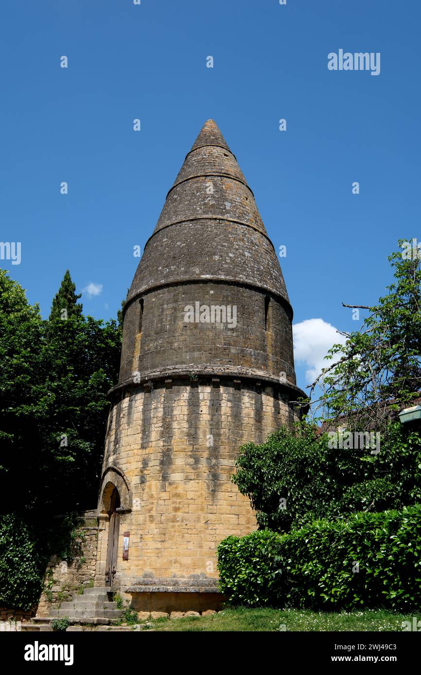 Historical landmark Lanterne des Morts is a stone tower usually marking the location of a cemetary. Sarlat-la-Caneda in France Stock Photo