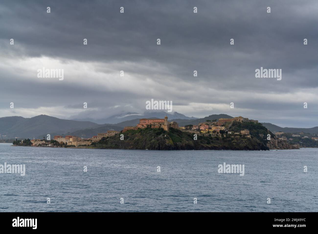 View of Portoferraio with the lighthouse and castle in the foreground Stock Photo