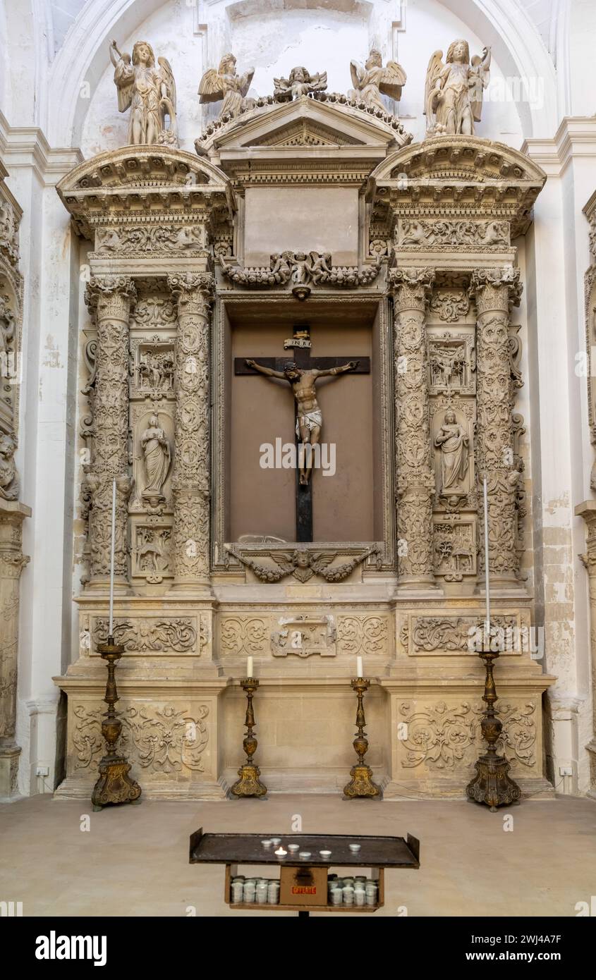 Altar in a side chapel of the Church of Saint Irene in the Old Town of Lecce Stock Photo