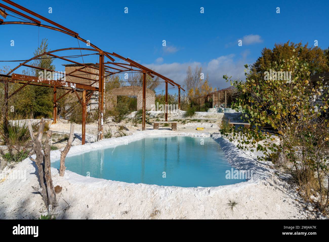 Turquoise hot spring pools in white gypsum baths in Bagni San Filippo in Tuscany Stock Photo