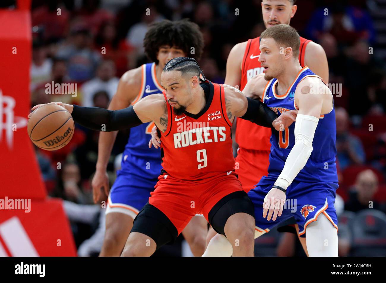 Houston Rockets forward Dillon Brooks (9) pushes off New York Knicks