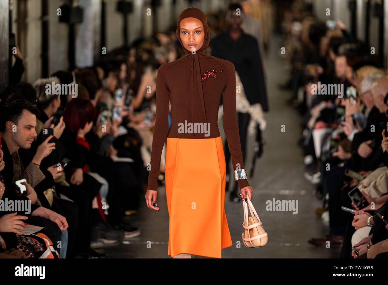 A model walks the runway during the Tory Burch fall/winter 2024 fashion ...