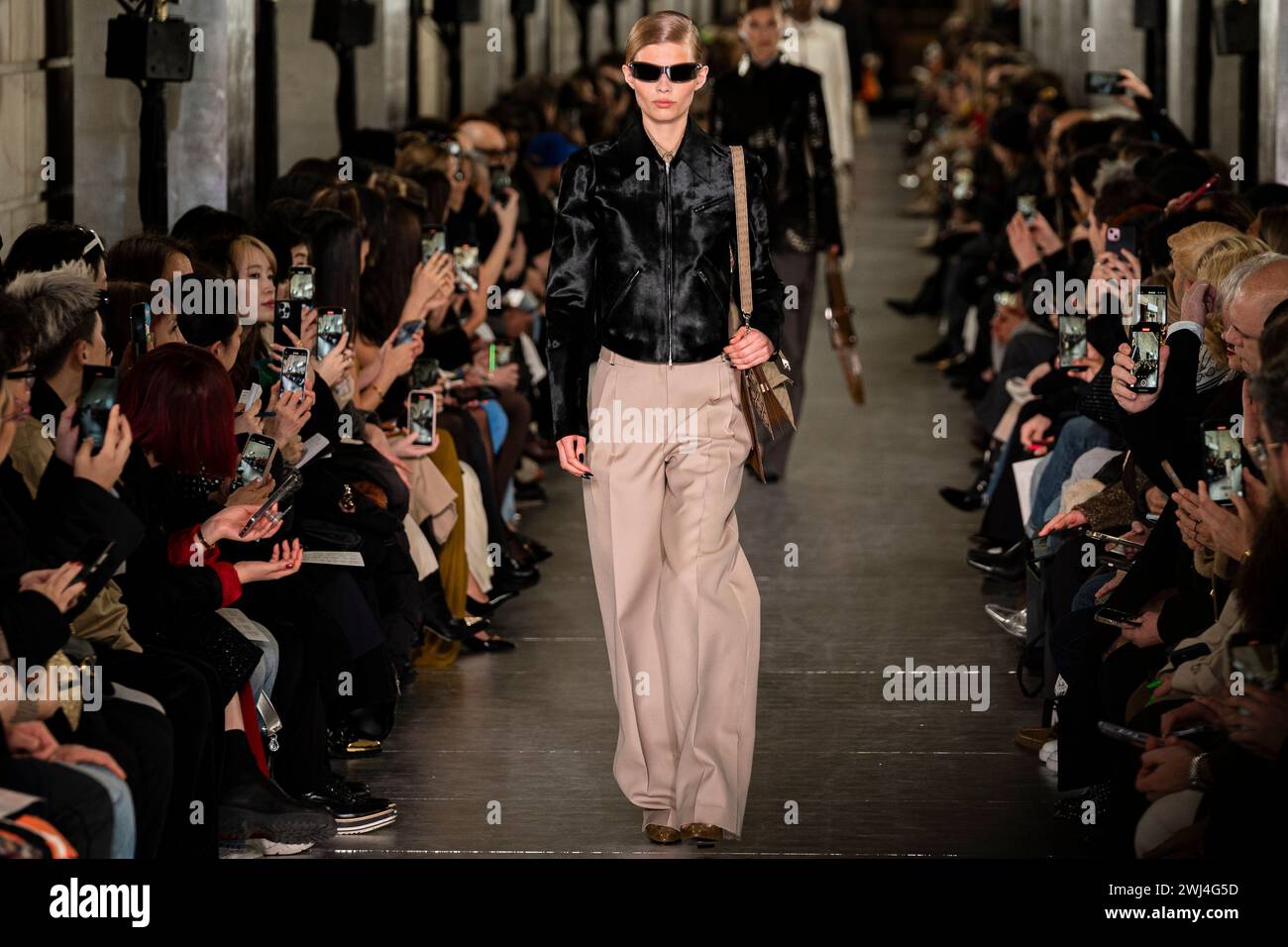 A model walks the runway during the Tory Burch fall/winter 2024 fashion ...