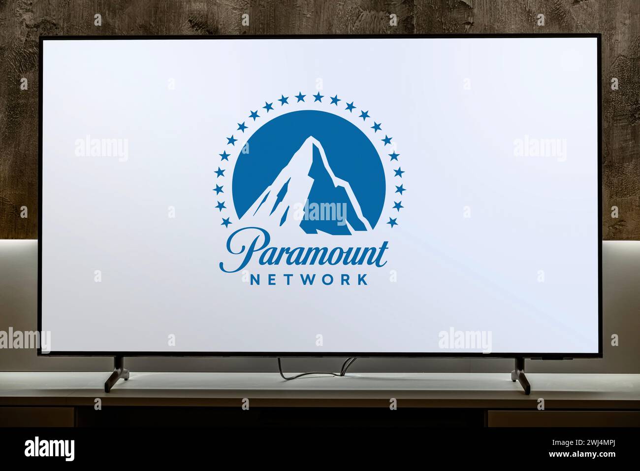 POZNAN, POL DEC 19, 2023 Flatscreen TV set displaying logo of