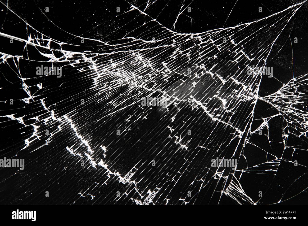 Broken glass texture on black background Stock Photo