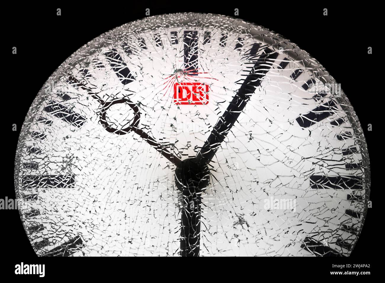 Shattered glass on a train station clock at night, detail, Witten, North Rhine-Westphalia, Germany Stock Photo