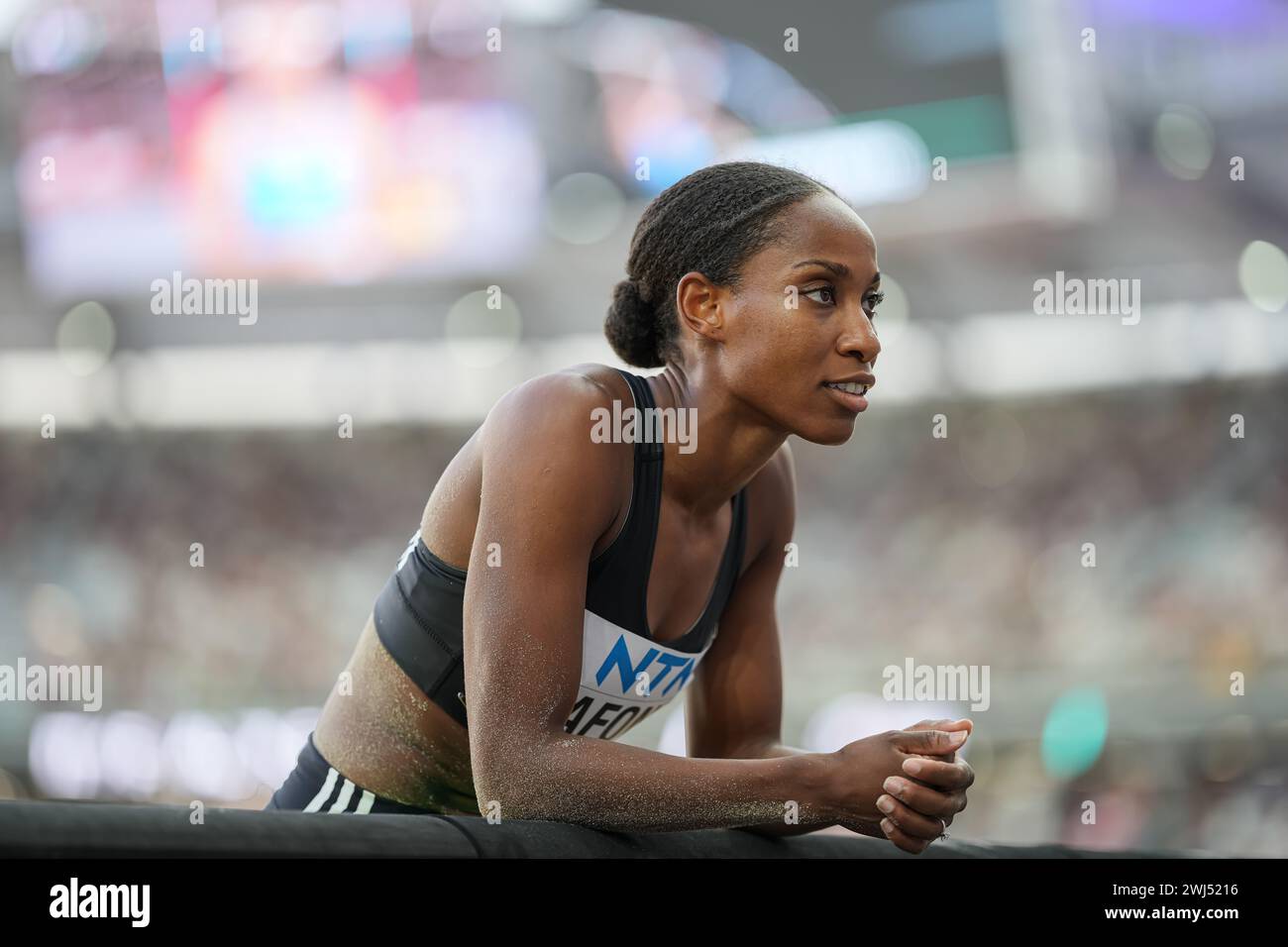 Thea LAFOND participating in the triple jump at the World Athletics