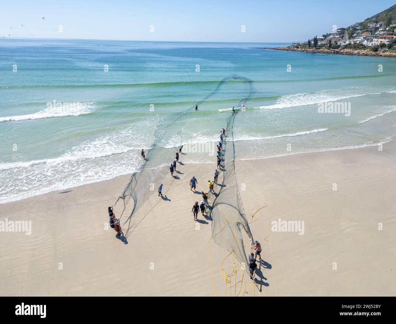 Trek fishermen, pulling fishing nets in with yellowtail catch, Fish ...