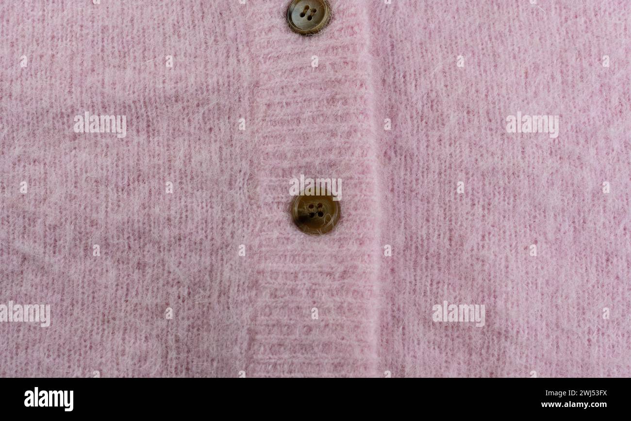 Pink mohair and alpaca wool from a cardigan as background Stock Photo