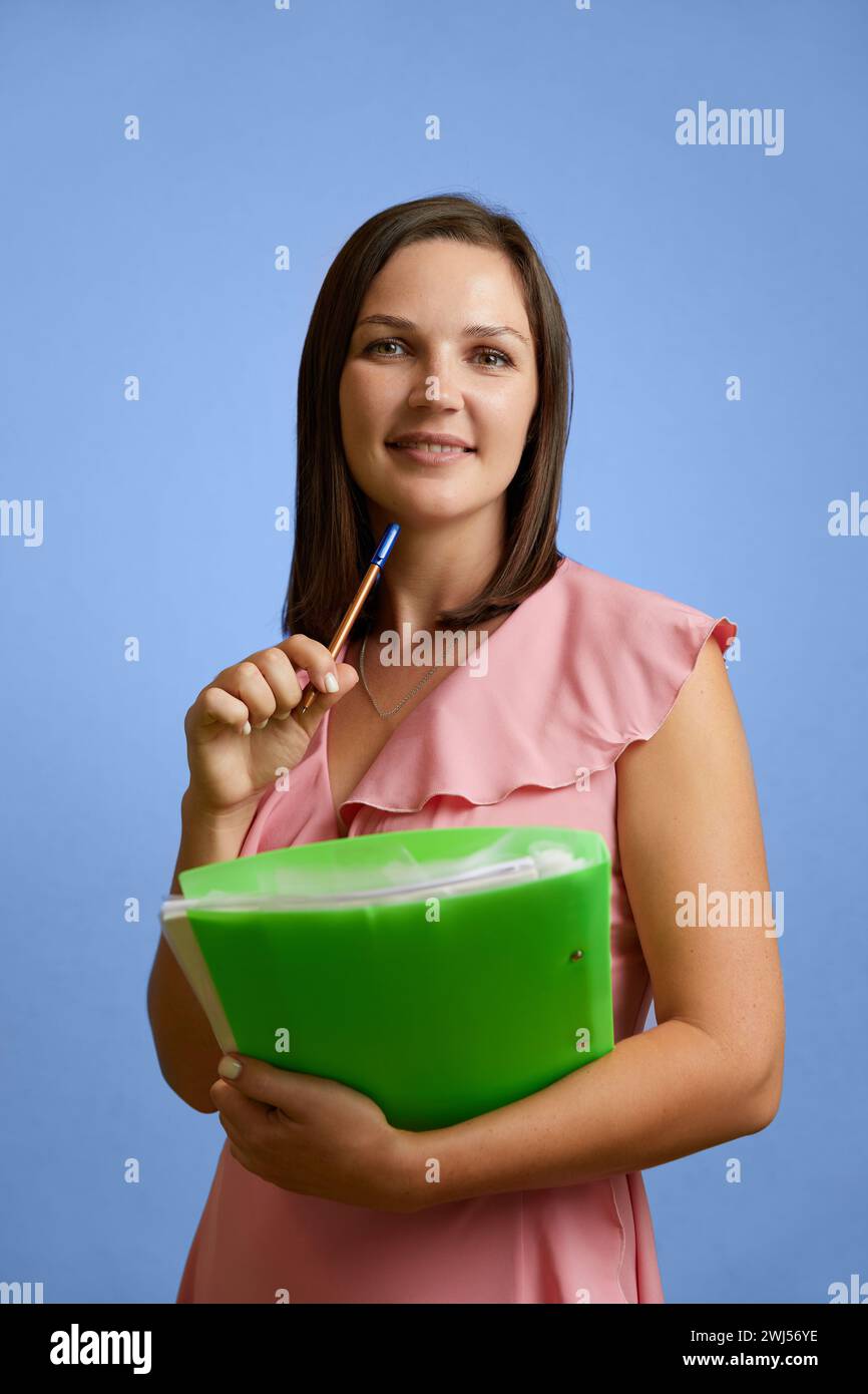 Portrait of Caucasian young female teacher standing on white background ...