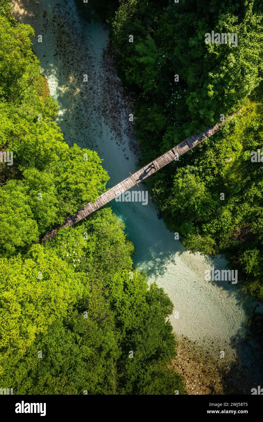 Man walking suspension bridge hi-res stock photography and images - Alamy