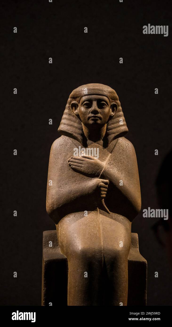 An ancient Egyptian figure displayed at the Neues Museum in Berlin Stock Photo