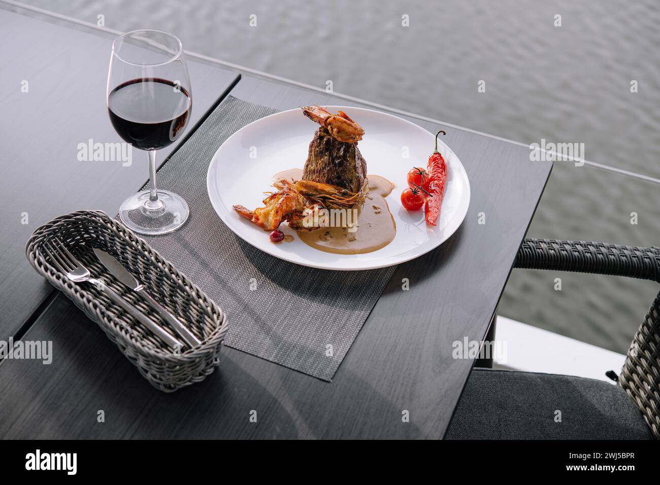 A delicious shrimp scampi dish with red wine Stock Photo