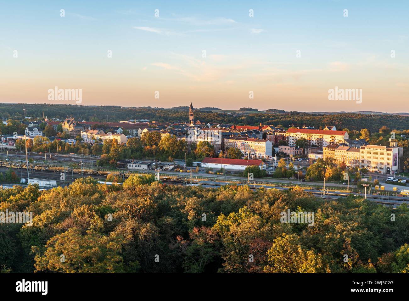 View from lookout tower on Barenstein hill above Plauen city in Germany during autumn sunset Stock Photo