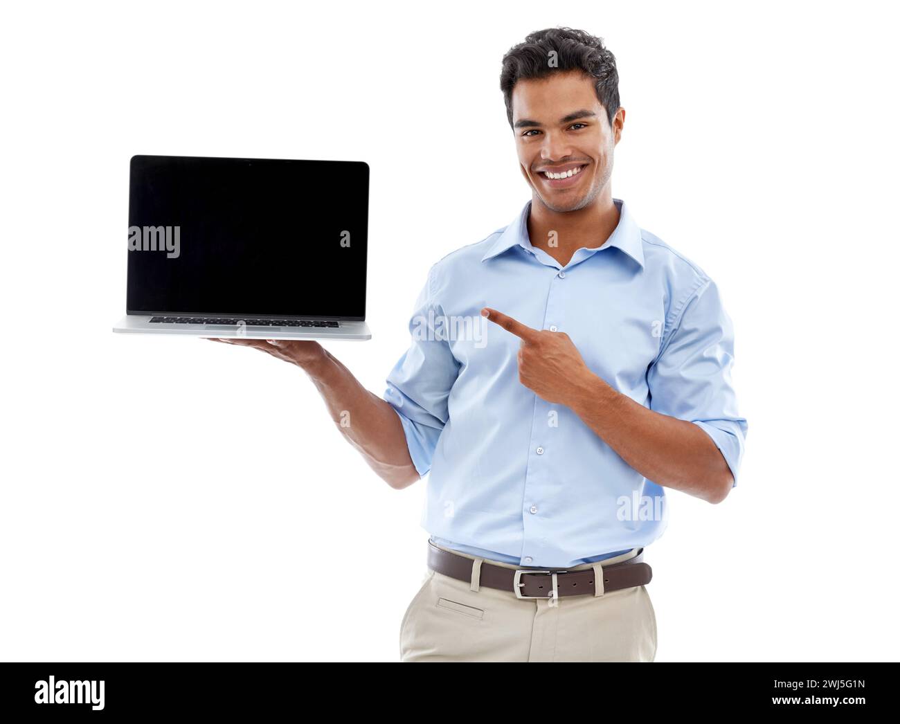 Business man, laptop and pointing at mockup screen for advertising, ads and info with tech in studio. Software, UX and marketing for web design with Stock Photo