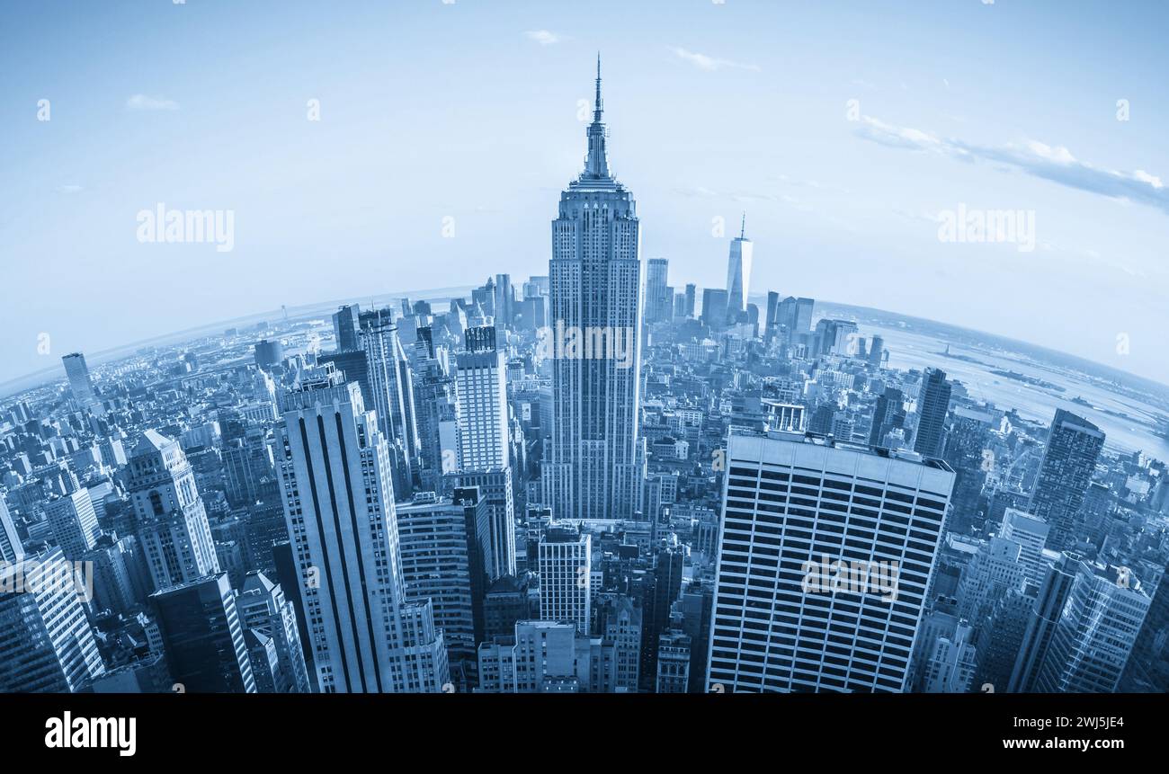Fisheye aerial view of Manhattan in New York City, USA. Skyline panorama at sunset. Fish eye lens effect Stock Photo