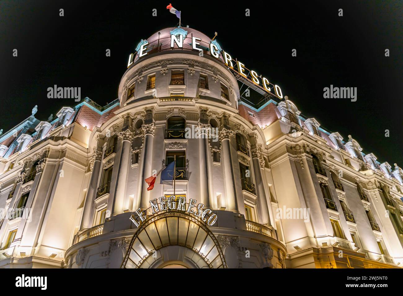 Nighttime shot of the iconic Le Negresco hotel and restaurant on the Promenade des Anglais, Nice on the Côte d'Azur, France. Stock Photo