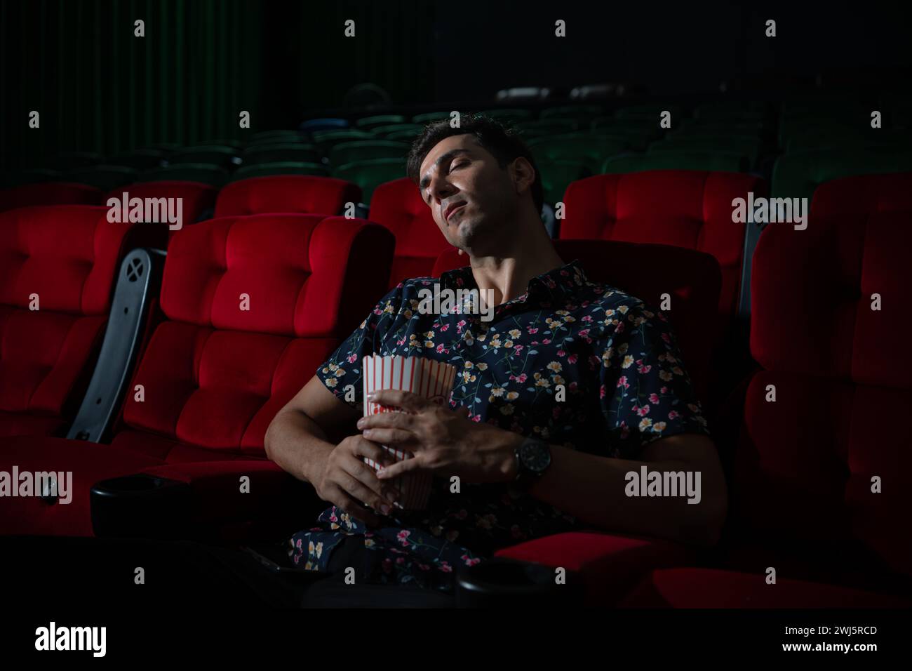 Man armchair popcorn hi res stock photography and images Alamy Man armchair popcorn hi res stock photography and images Alamy