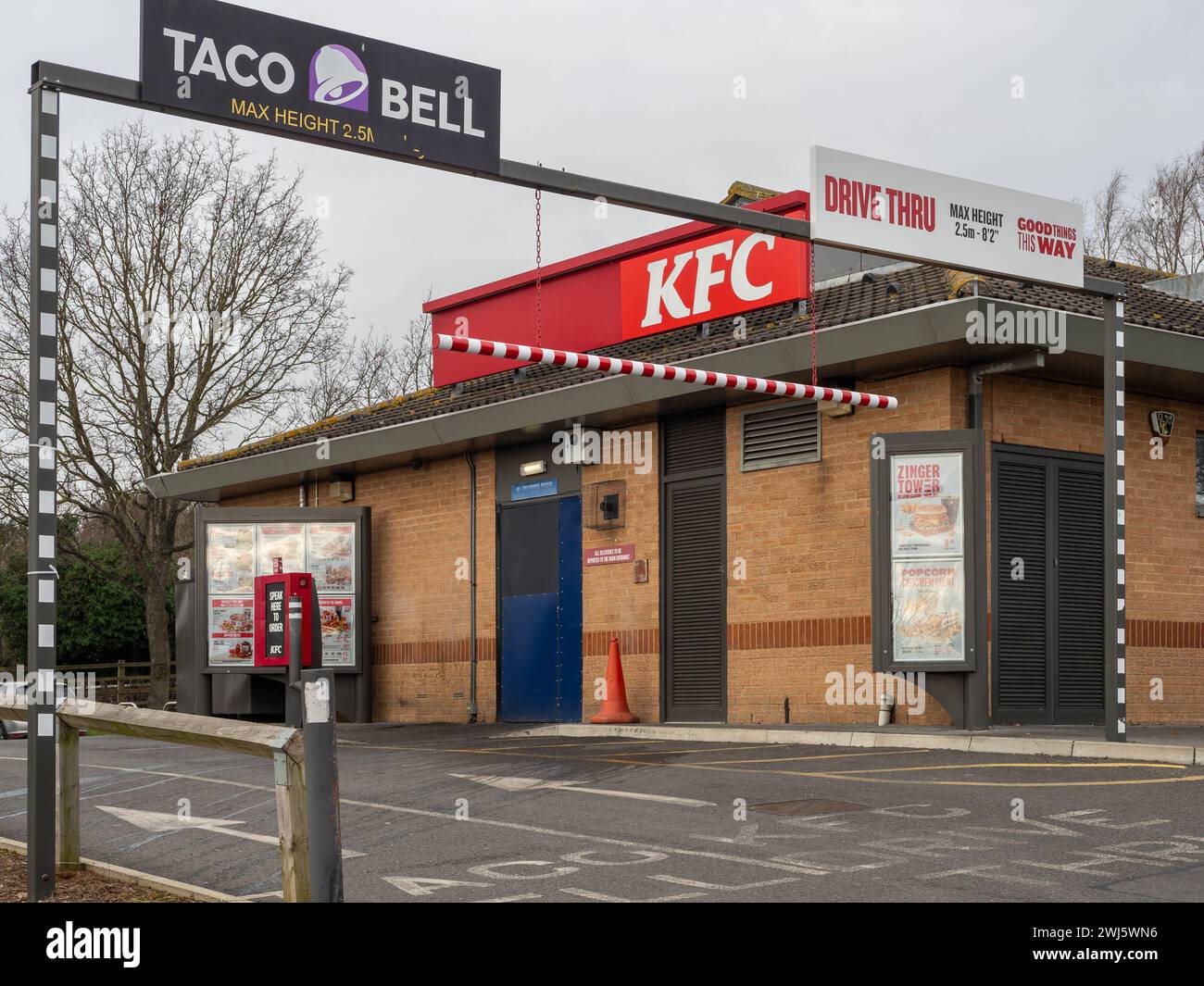 Vehicle entrance for Taco Bell and KFC drive thru restaurants, Sixfields, Northampton, UK Stock Photo