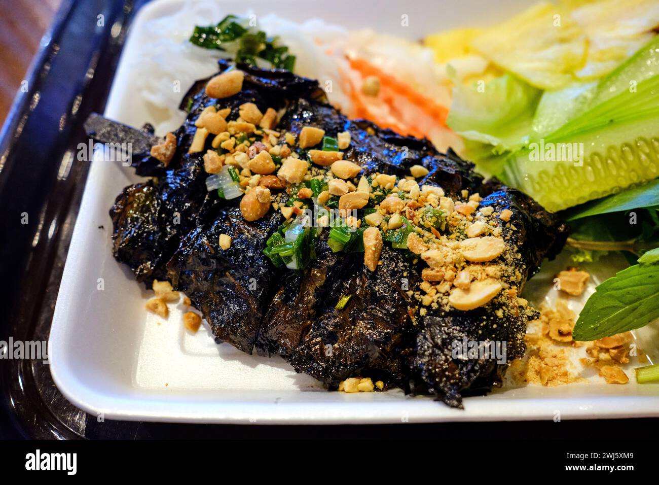 Vietnamese grilled beef in betel leaves (bo la lot / bò lá lốt Stock