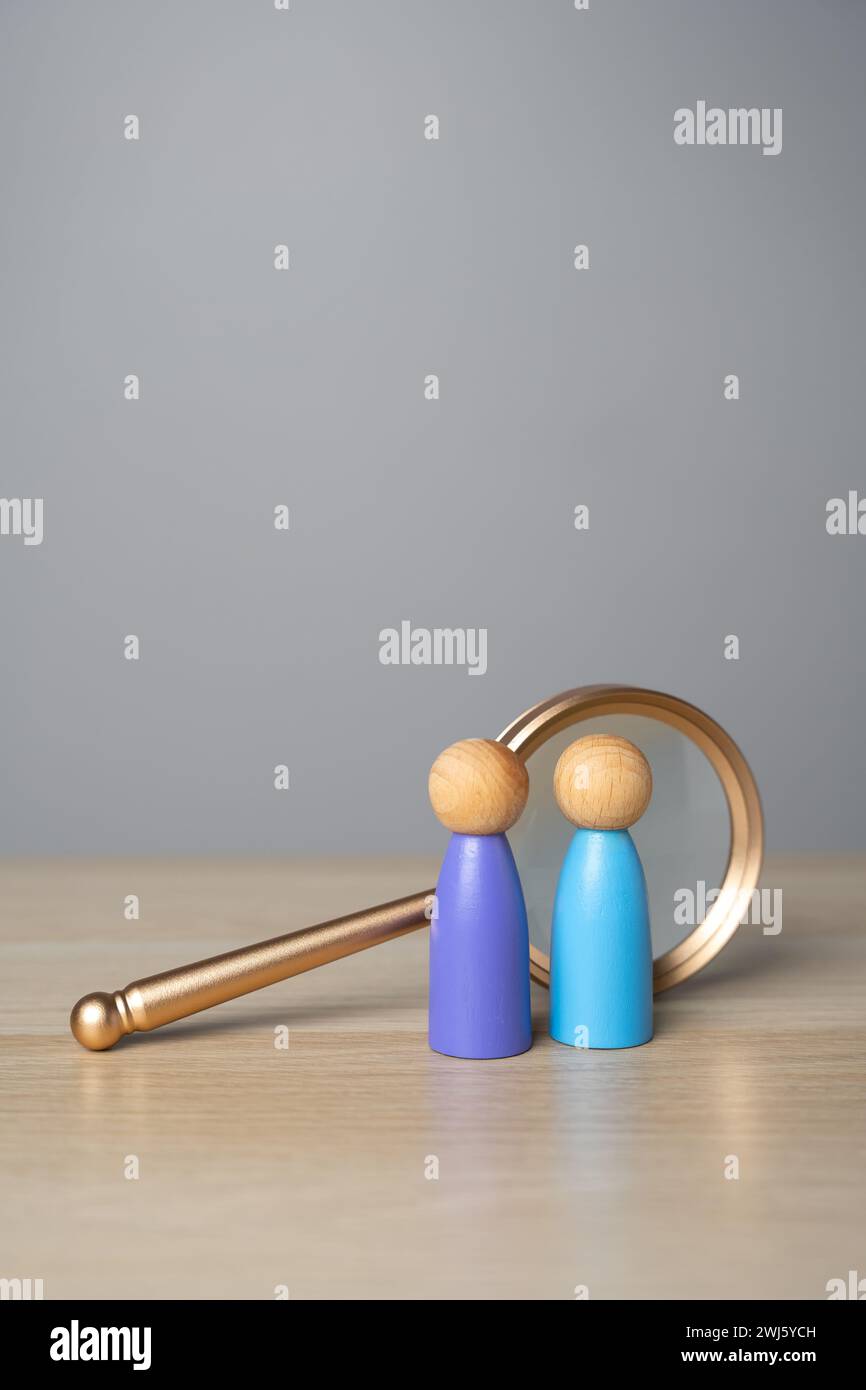 Find people to work with. People figures near a magnifying glass. Hiring and recruiting. Business and human capital, human resources. Selection of can Stock Photo