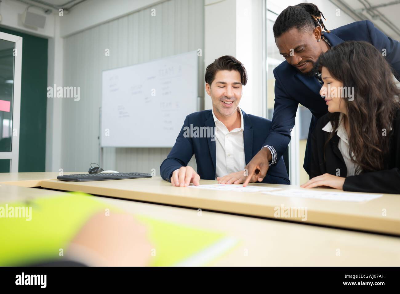 Group of business people working together in a meeting at the office. Stock Photo