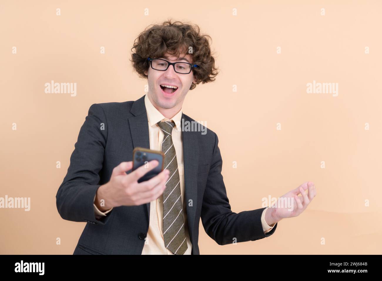 Stylish modern young curly man hi-res stock photography and images - Alamy