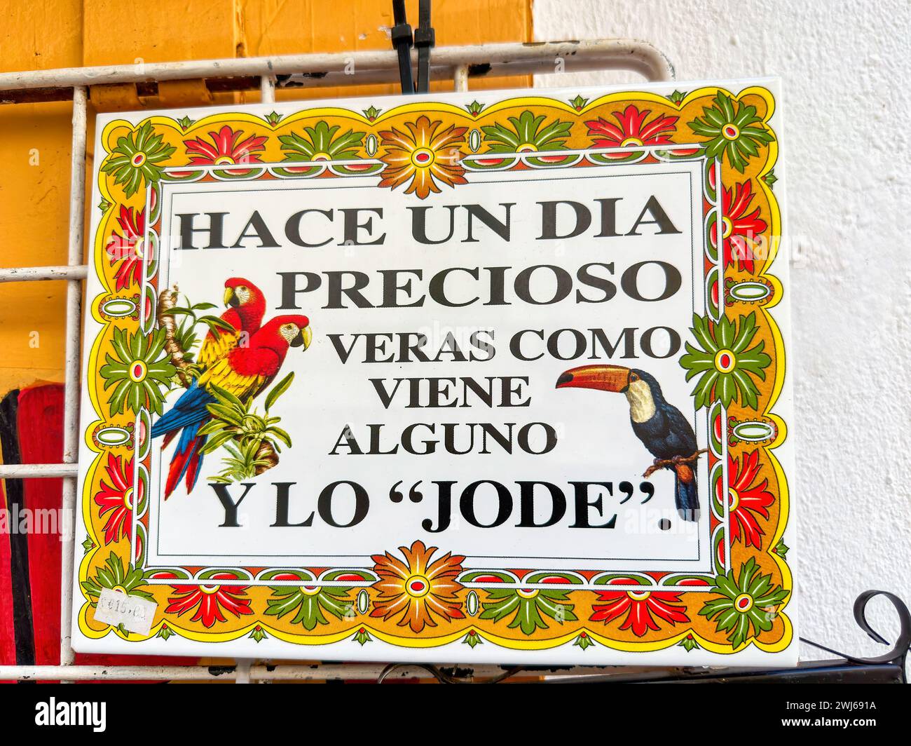 Souvenir tile with a funny phrase in Spanish language, Denia, Alicante, Spain Stock Photo