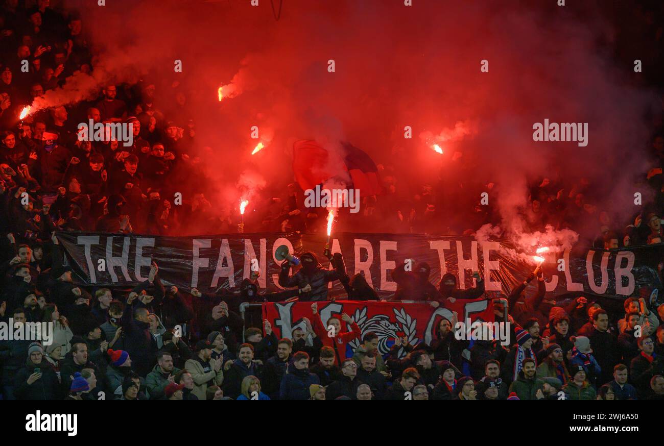 London, UK. 12th Feb, 2024 - Crystal Palace v Chelsea - Premier League - Selhurst Park.                                                                                   Crystal Palace fans with flares and banner.                                       Picture Credit: Mark Pain / Alamy Live News Stock Photo